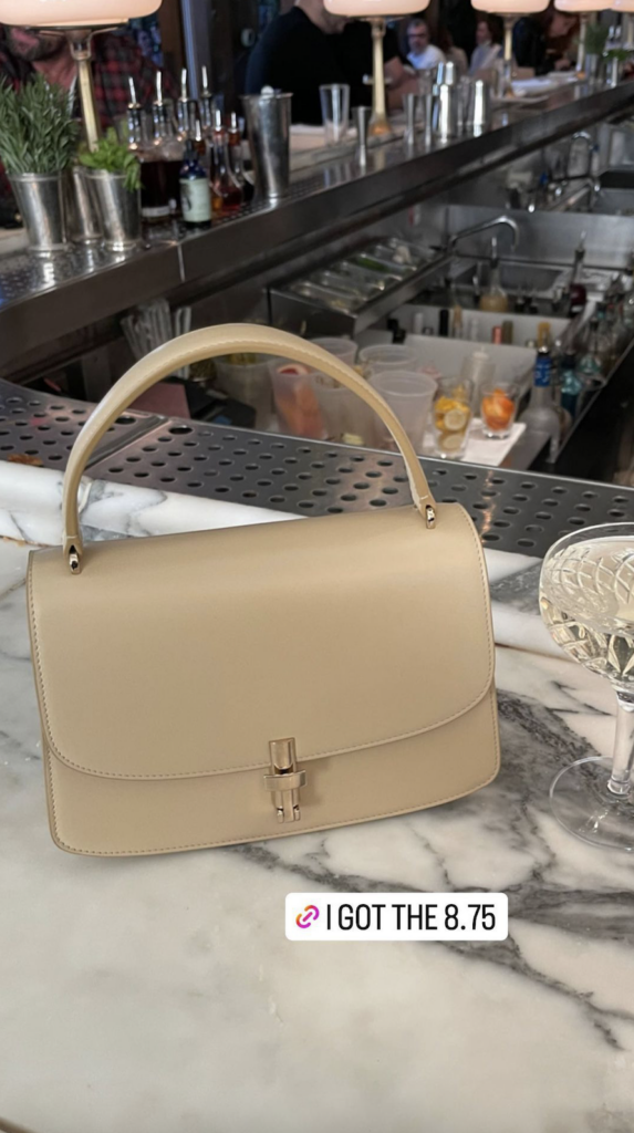 Luxe, butter cream colored The Row bag, designer
